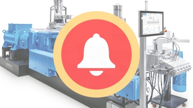Alert icon in front of Coperion ZSK extruder