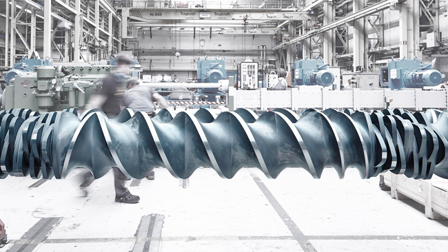 Coperion twin screws of extruder in assembly hall